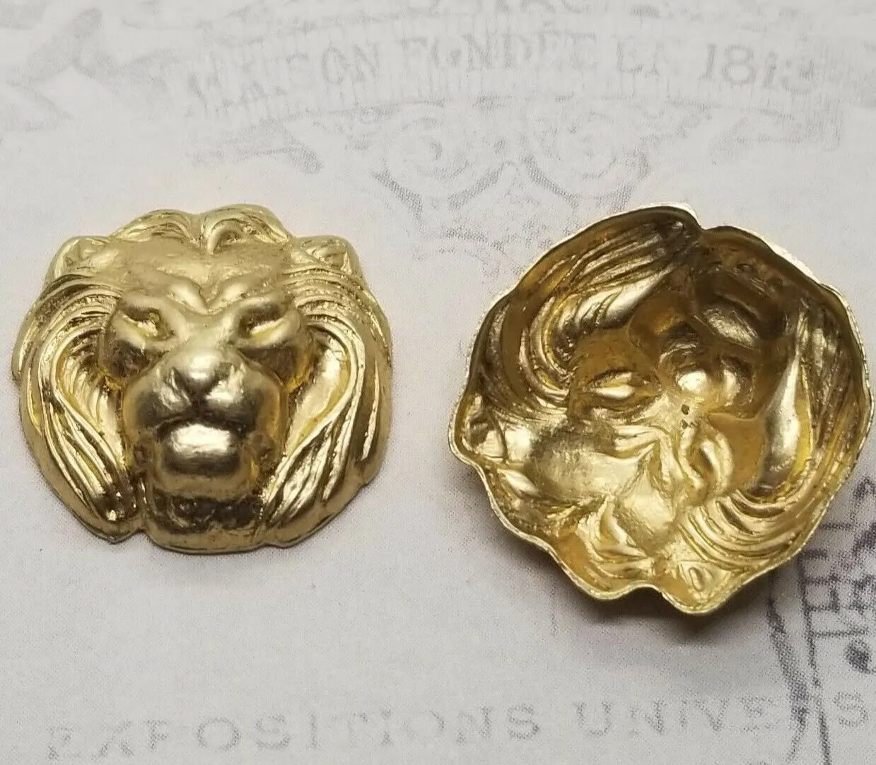 Brass Lion Head Stampings x 2 - 132RAT.